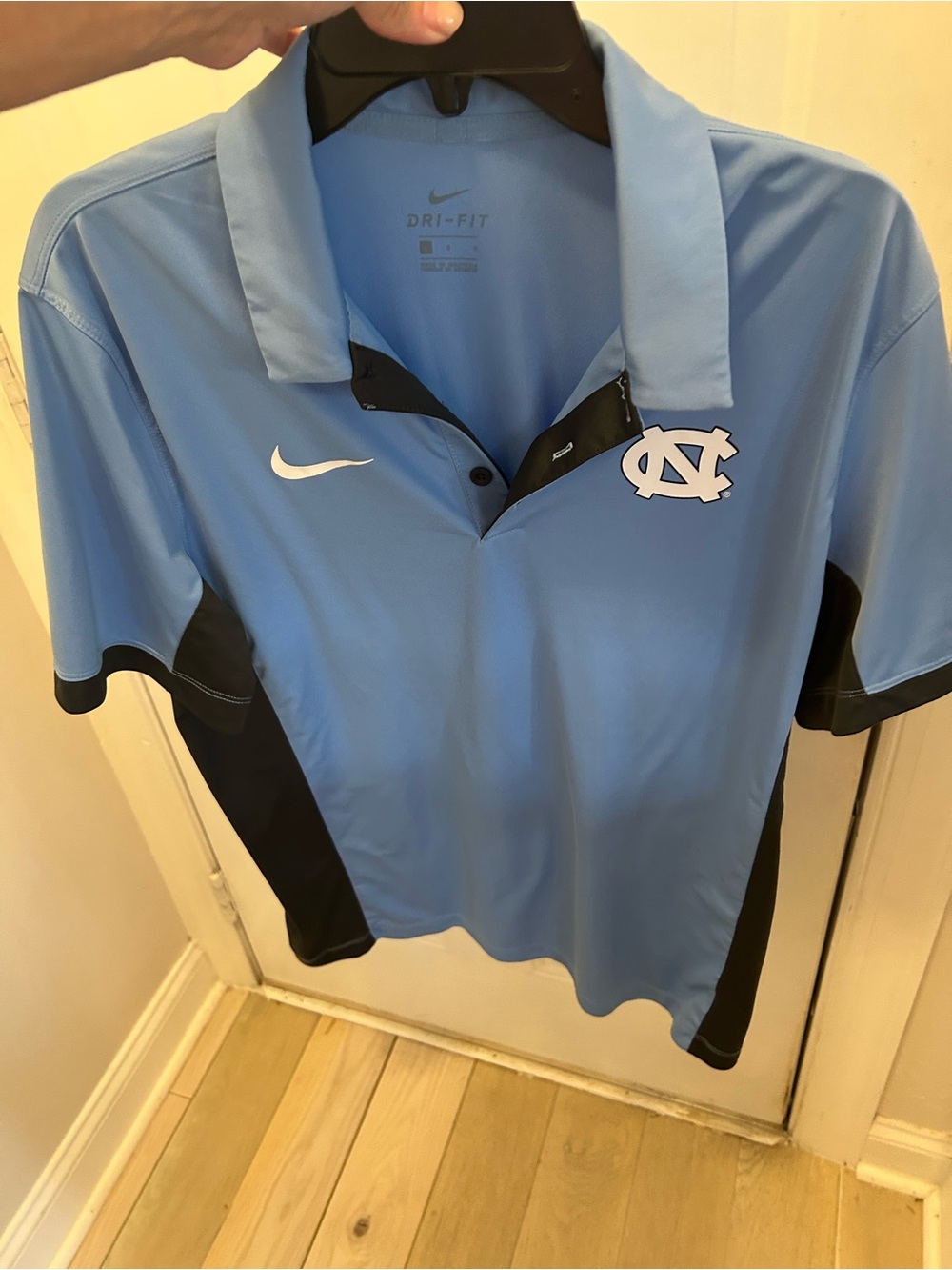 NIKE CAROLINA polo shirt.